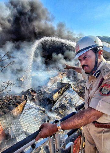 Shri.Nitin Raiker during a fire disaster image